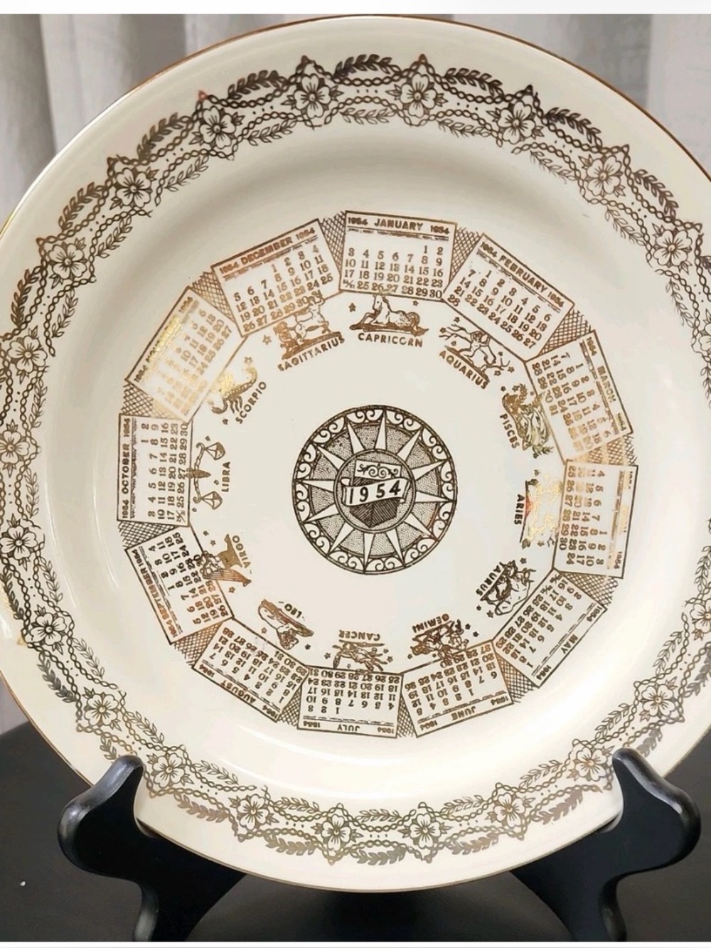 1954 Nautilus calendar plate. Great for Mid century modern decor or farm house.